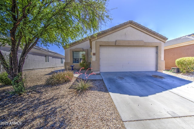 23993 N Desert Dr, Florence, AZ 85132 - view of front of house with concrete driveway, stucco siding, and a garage