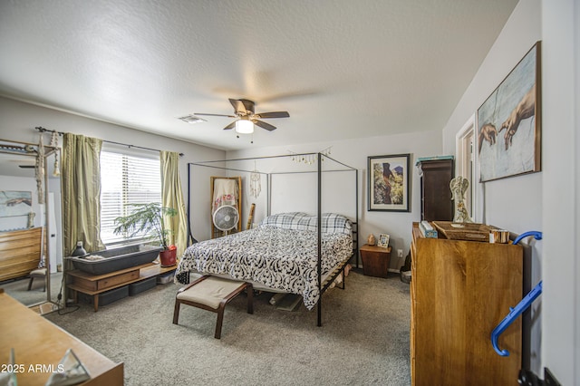 23993 N Desert Dr, Florence, AZ 85132 - carpeted bedroom featuring a textured ceiling and ceiling fan