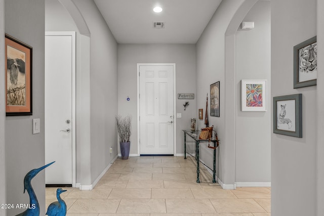 view of tiled foyer entrance