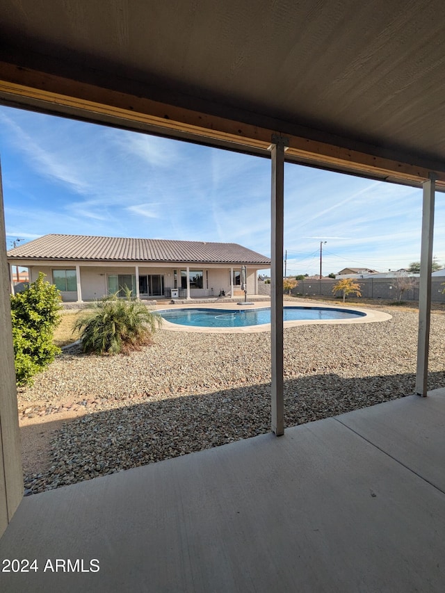 view of pool with a patio area