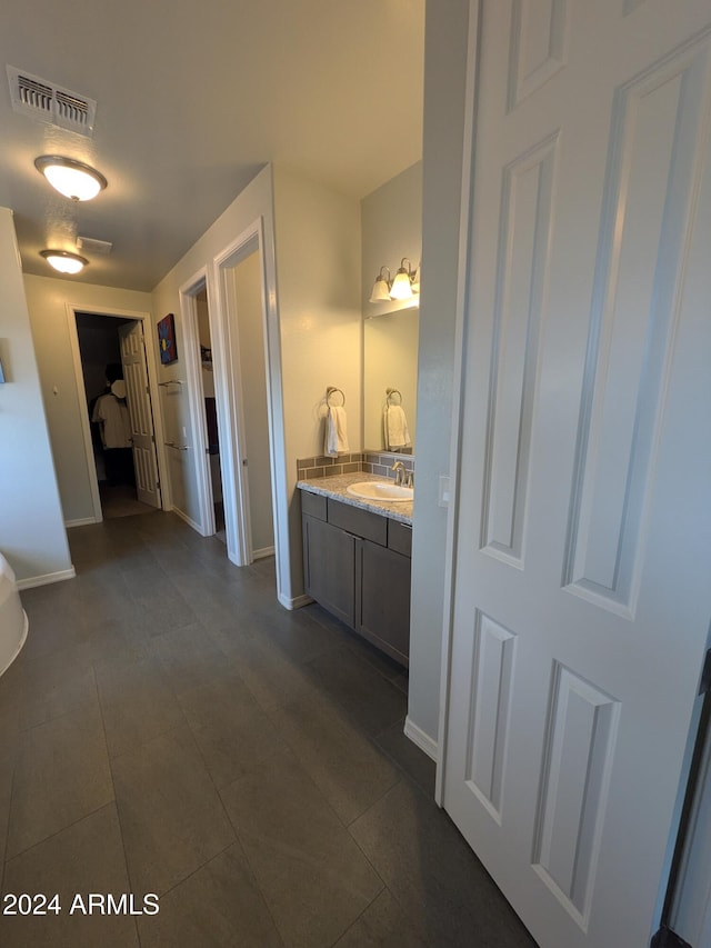 bathroom featuring vanity and tile patterned floors