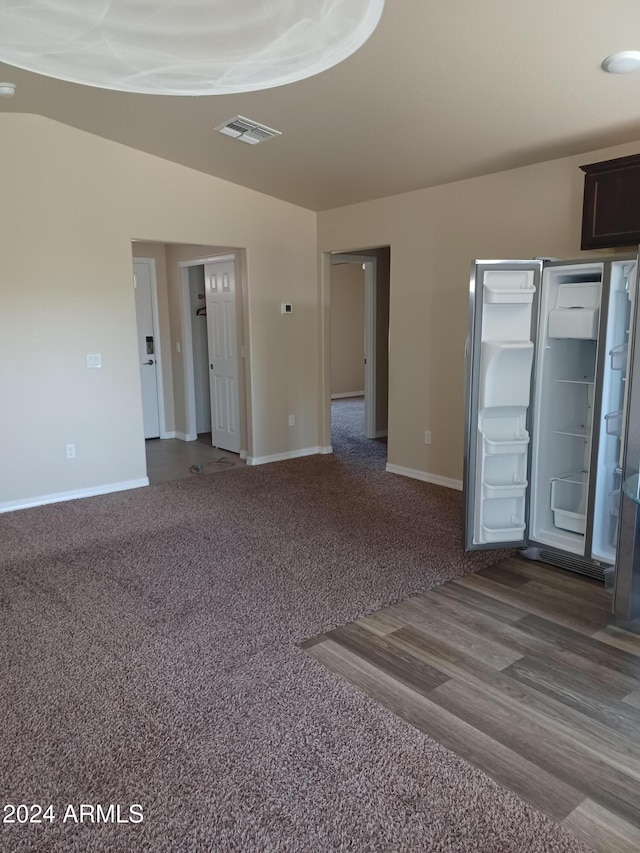 spare room featuring hardwood / wood-style floors