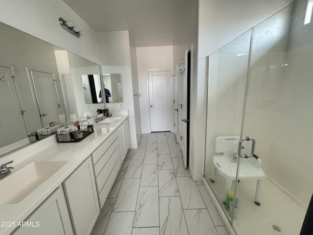 bathroom with vanity and an enclosed shower