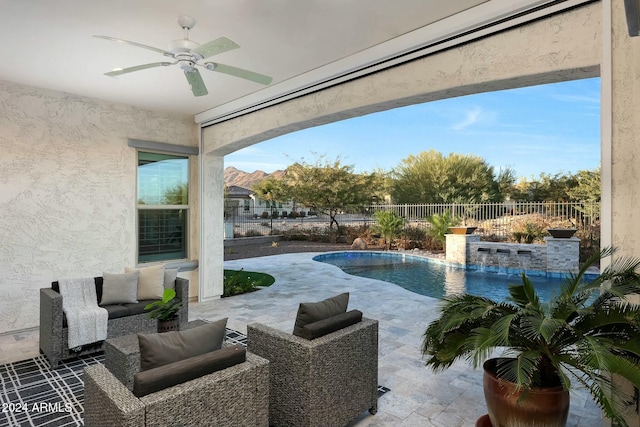 20594 W Pasadena Ave, Buckeye, AZ 85396 - fenced backyard featuring a ceiling fan and a patio