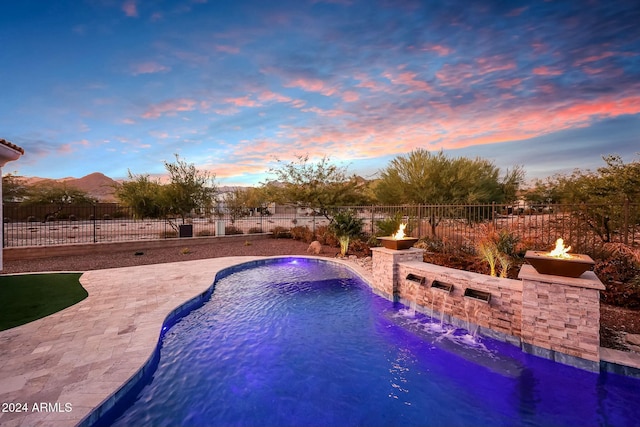 20594 W Pasadena Ave, Buckeye, AZ 85396 - view of swimming pool with a fenced backyard and a patio area