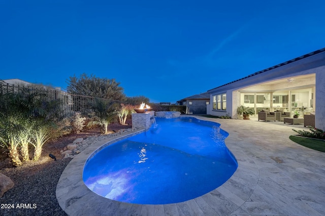 20594 W Pasadena Ave, Buckeye, AZ 85396 - view of swimming pool with a patio, a fenced backyard, and an outdoor hangout area