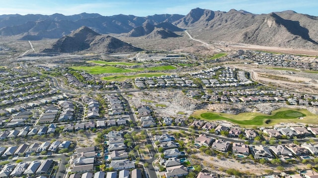 20594 W Pasadena Ave, Buckeye, AZ 85396 - aerial view of property and surrounding area with a mountainous background, nearby suburban area, and a golf club