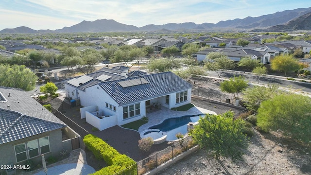 20594 W Pasadena Ave, Buckeye, AZ 85396 - aerial perspective of suburban area featuring a mountain backdrop