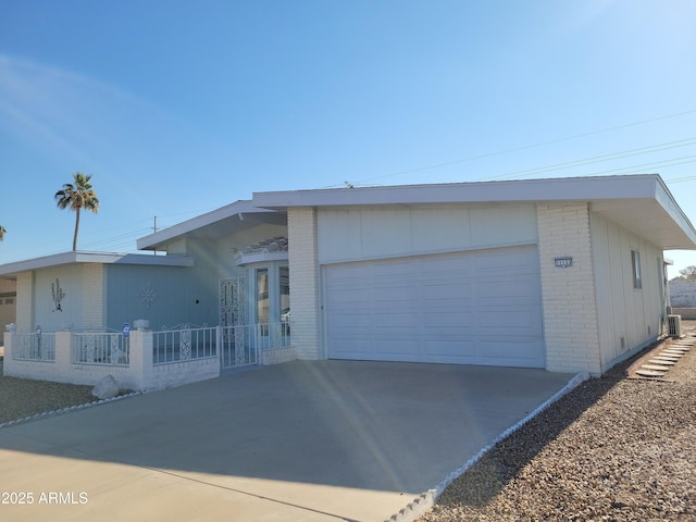 single story home featuring a garage