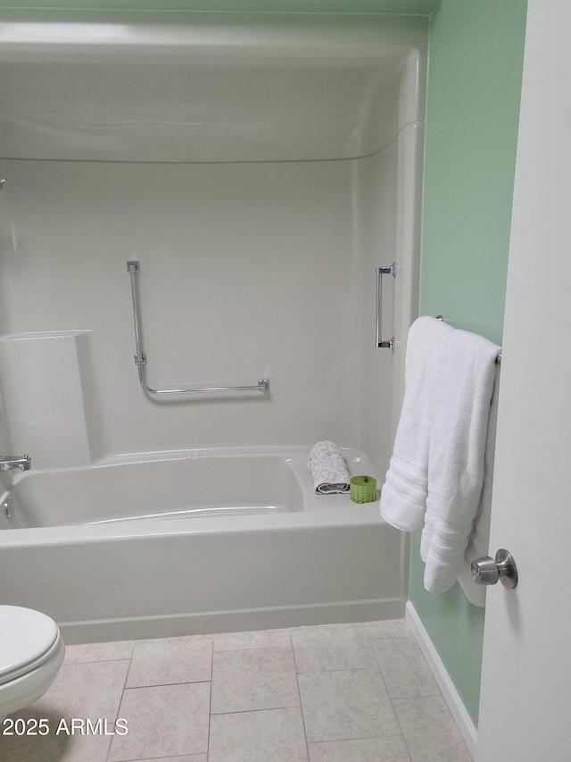 bathroom featuring tile patterned floors and toilet