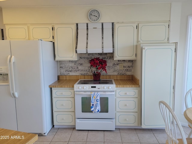 kitchen with white cabinets, white appliances, decorative backsplash, and light tile patterned floors