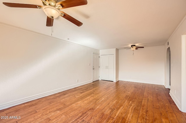 unfurnished room with light wood-type flooring