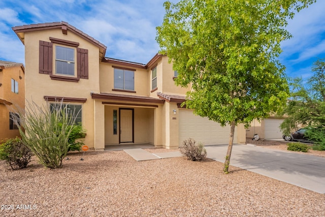 694 W Desert Seasons Dr, San Tan Valley, AZ 85143 - view of property featuring stucco siding, an attached garage, and driveway