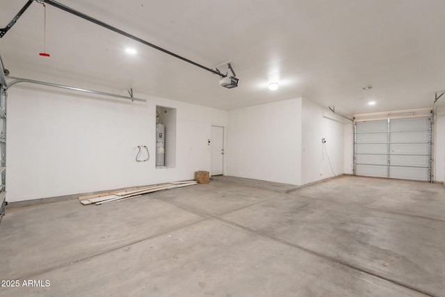694 W Desert Seasons Dr, San Tan Valley, AZ 85143 - garage featuring a garage door opener and electric water heater