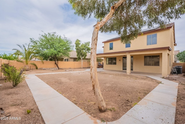 694 W Desert Seasons Dr, San Tan Valley, AZ 85143 - view of front of property with a patio area, solar panels, and stucco siding
