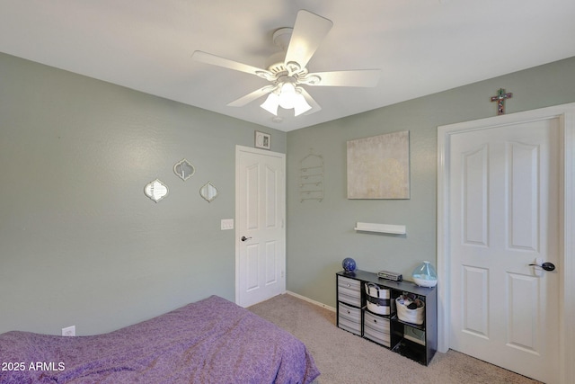18590 W Vogel Ave, Goodyear, AZ 85338 - bedroom with light colored carpet and a ceiling fan
