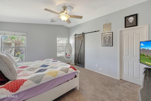 18590 W Vogel Ave, Goodyear, AZ 85338 - carpeted bedroom with baseboards, vaulted ceiling, a ceiling fan, a barn door, and visible vents