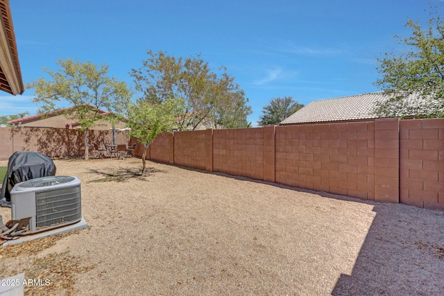 18590 W Vogel Ave, Goodyear, AZ 85338 - view of yard with a fenced backyard and central AC