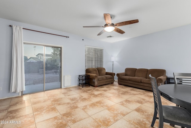 living room with ceiling fan