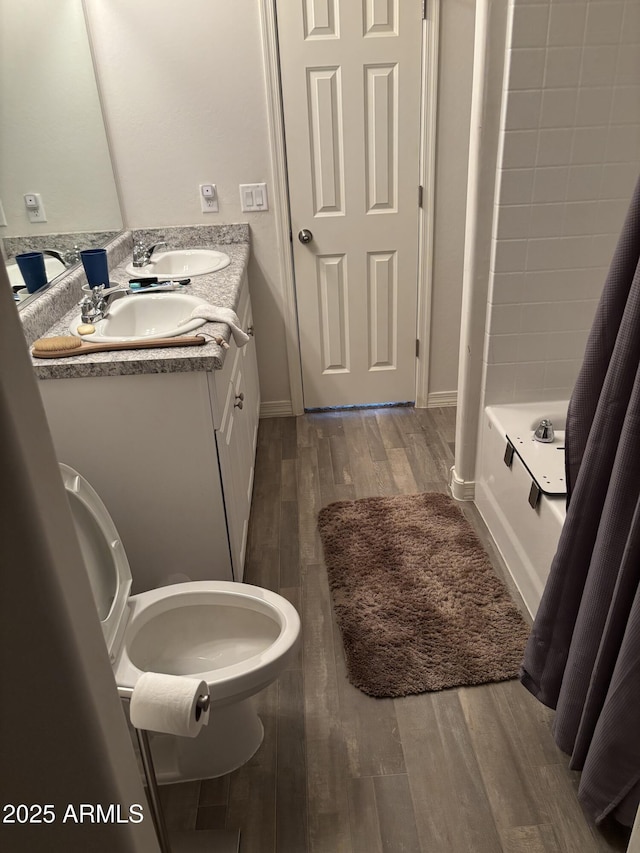 131 E Douglas Ave, Coolidge, AZ 85128 - bathroom with wood finished floors and double vanity