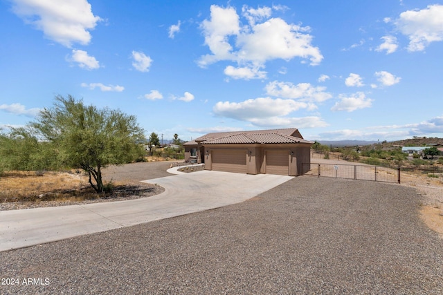 view of front of property featuring a garage