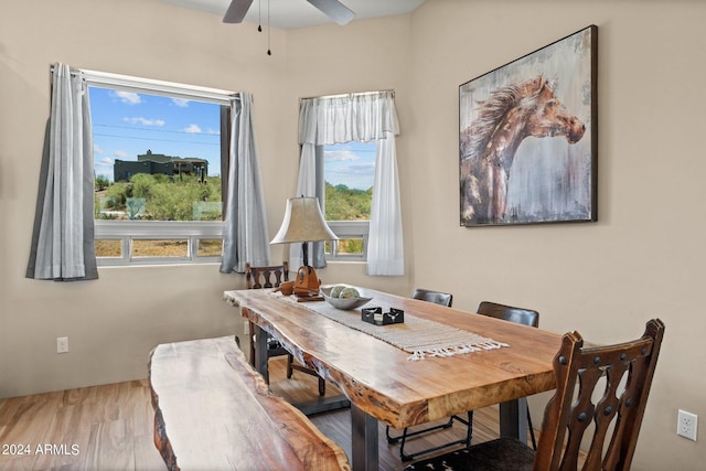 dining room featuring ceiling fan and light wood-type flooring