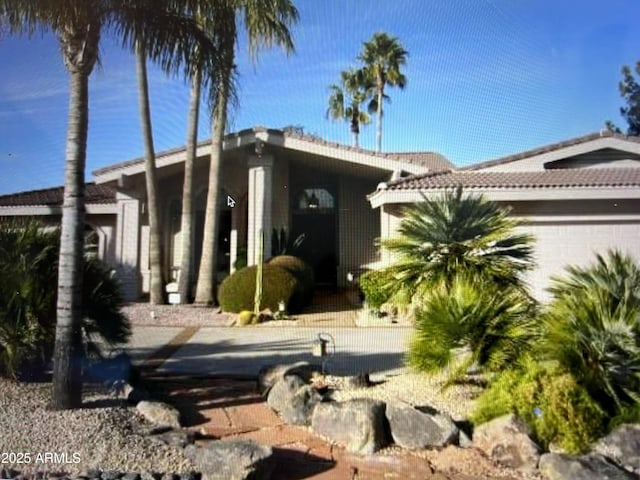 view of front of house featuring an attached garage