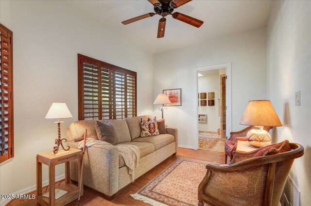 18738 E Buckskin Dr, Rio Verde, AZ 85263 - living room featuring ceiling fan, baseboards, and wood finished floors