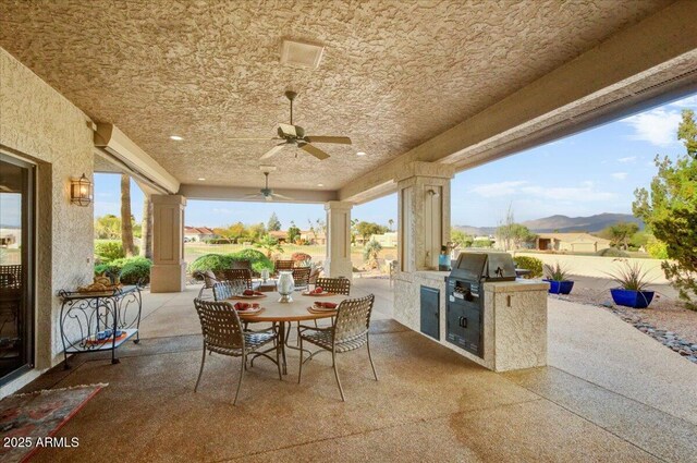 18738 E Buckskin Dr, Rio Verde, AZ 85263 - view of patio with area for grilling, grilling area, ceiling fan, and outdoor dining space