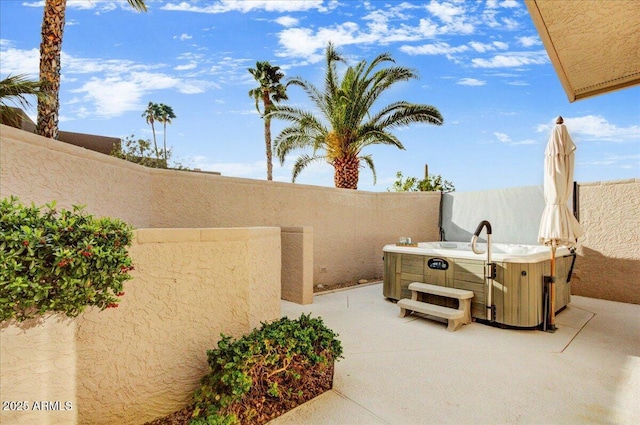 18738 E Buckskin Dr, Rio Verde, AZ 85263 - view of patio with a hot tub and fence