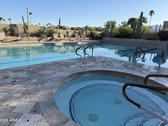 18738 E Buckskin Dr, Rio Verde, AZ 85263 - community pool with a fenced backyard and a patio