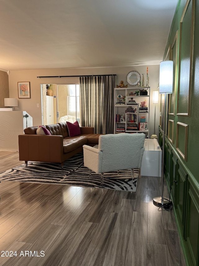 living room with dark hardwood / wood-style flooring