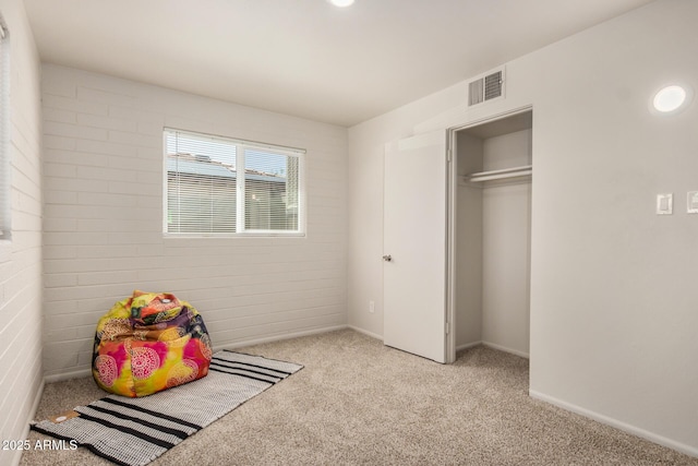 rec room with light colored carpet, visible vents, and baseboards