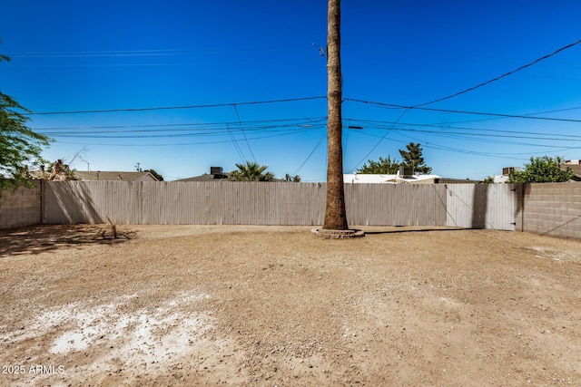 view of yard featuring a fenced backyard