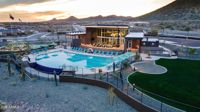 11946 W Calle De Pompas, Peoria, AZ 85383 - community pool with a mountain view and a patio