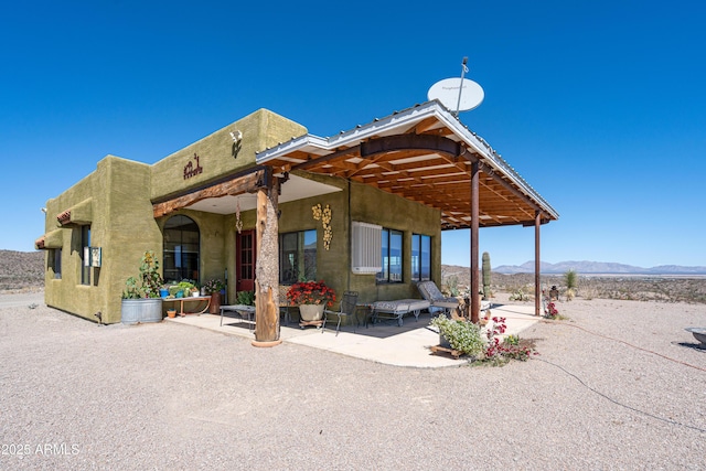 42617 Hovatter Rd, Salome, AZ 85348 - rear view of house featuring a mountain view and a patio