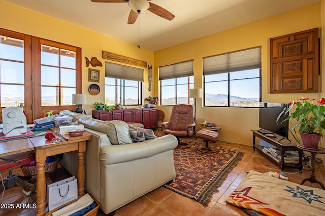 42617 Hovatter Rd, Salome, AZ 85348 - tiled living area with a ceiling fan