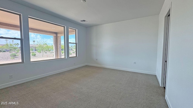 16777 W Sheila Ln, Goodyear, AZ 85395 - carpeted spare room featuring baseboards