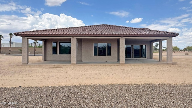 16777 W Sheila Ln, Goodyear, AZ 85395 - rear view of property with a patio, stucco siding, and a tile roof