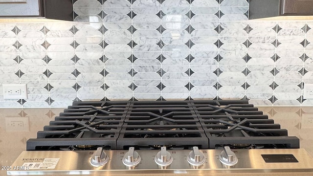 16777 W Sheila Ln, Goodyear, AZ 85395 - kitchen view of gas stovetop and backsplash