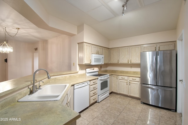 kitchen with a sink, light tile patterned flooring, white appliances, and light countertops