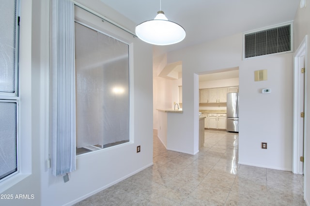 interior space with a sink and visible vents