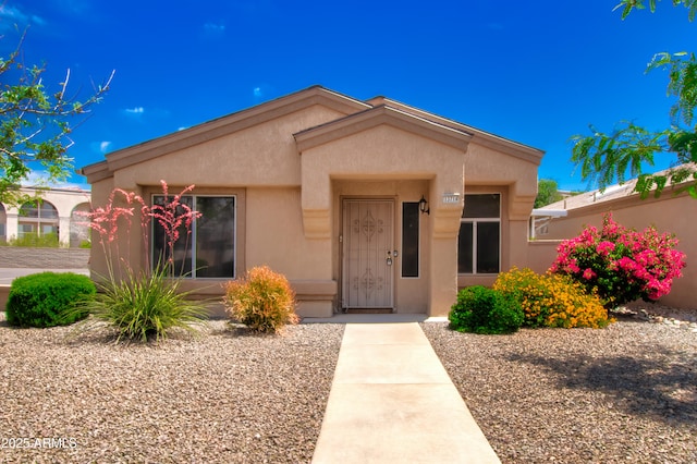 view of front of property featuring stucco siding