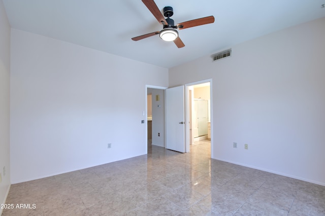 empty room with visible vents, ceiling fan, and light tile patterned flooring