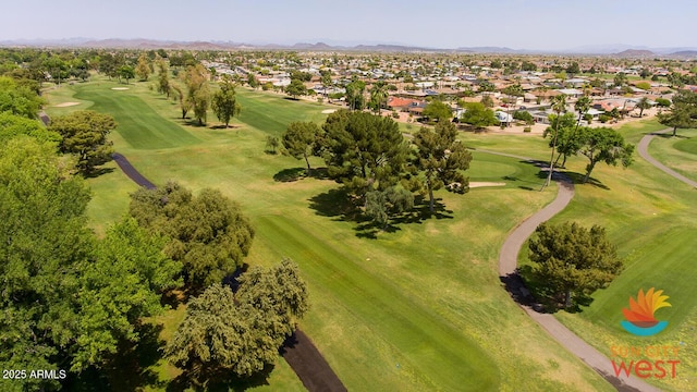 bird's eye view with a residential view, view of golf course, and a mountain view
