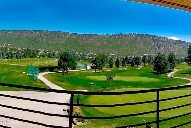 view of property's community with view of golf course