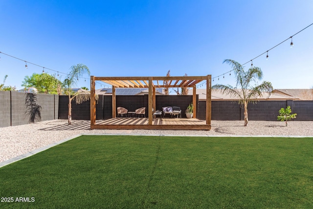 view of yard featuring a fenced backyard, a pergola, and a wooden deck