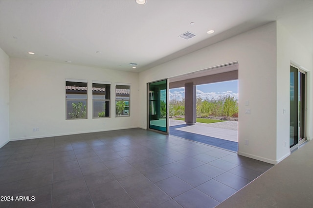 view of tiled spare room