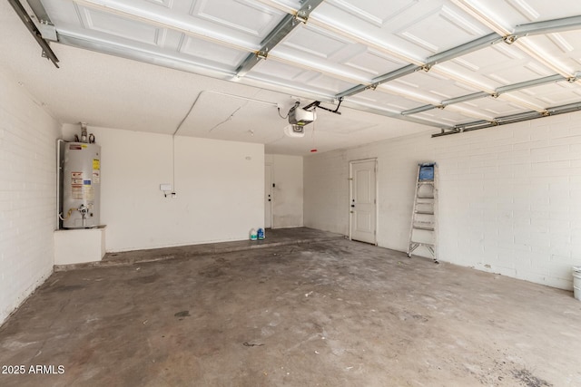 4802 W Hayward Ave, Glendale, AZ 85301 - garage with gas water heater, a garage door opener, and concrete block wall