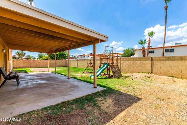 4802 W Hayward Ave, Glendale, AZ 85301 - view of yard featuring a patio area and a playground